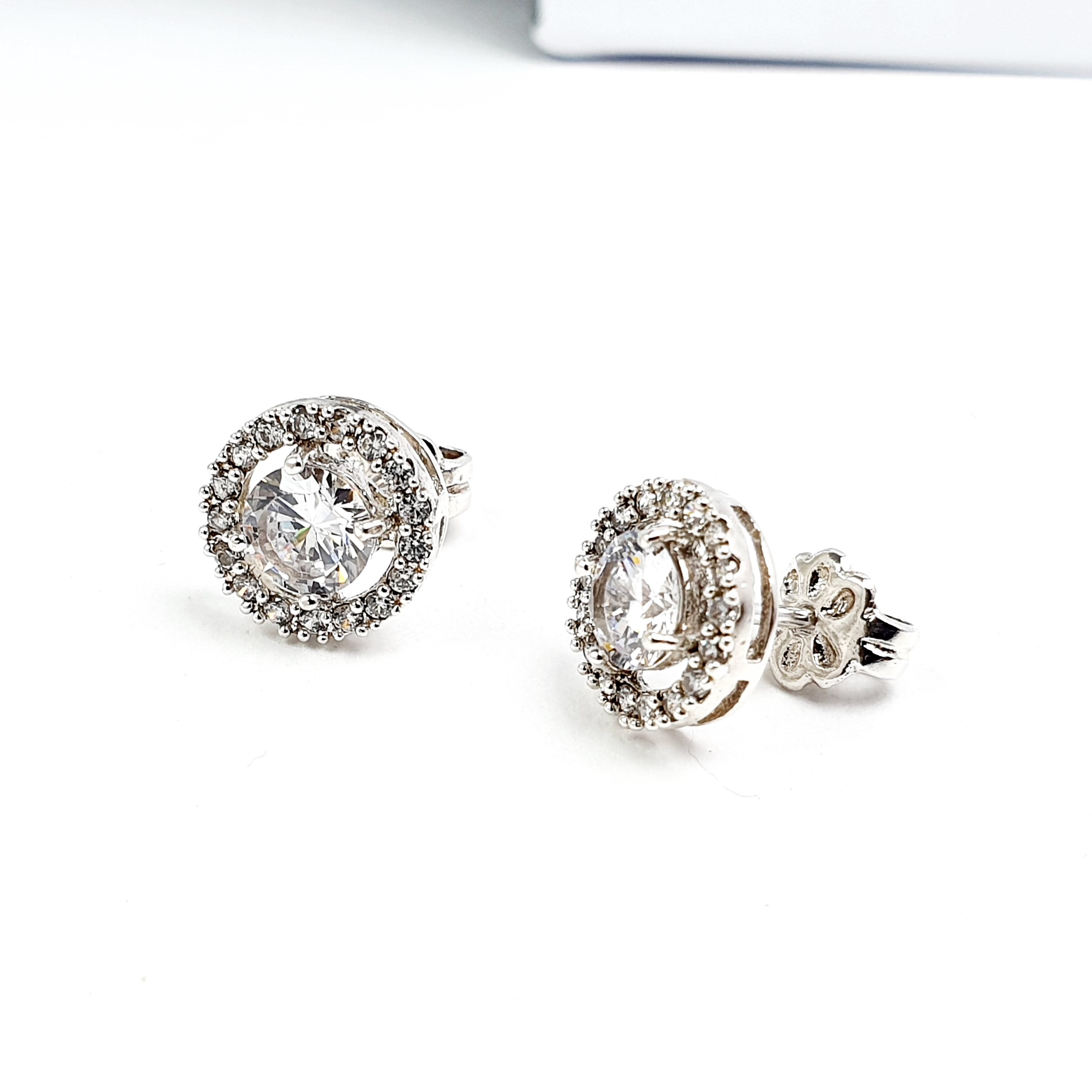 Aretes roseta en plata con piedra