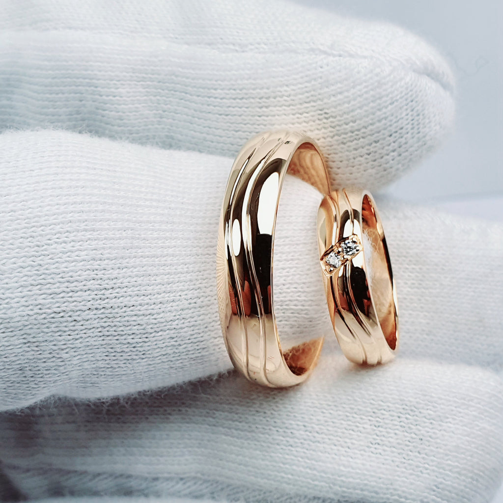 Aros de Boda con Detalles y Piedra oro 18k