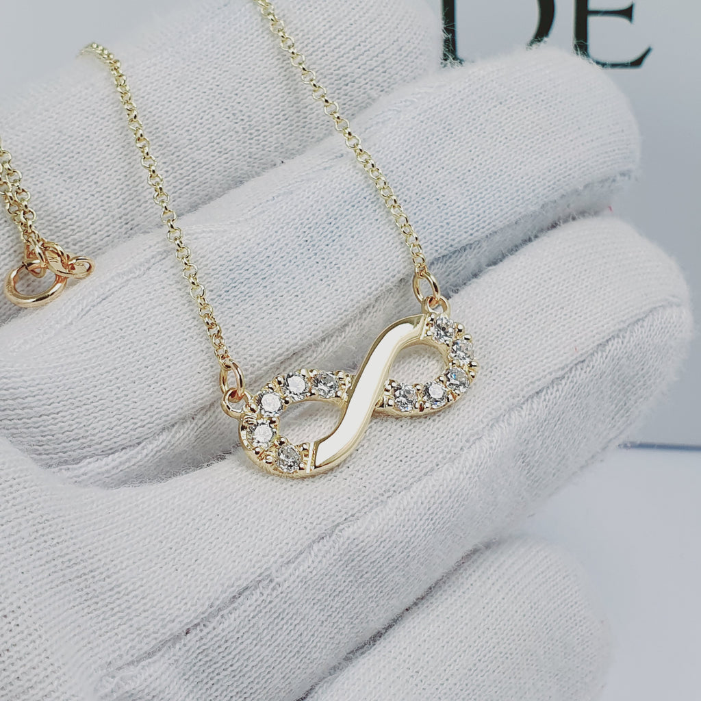 Collar infinito con piedras oro 18k