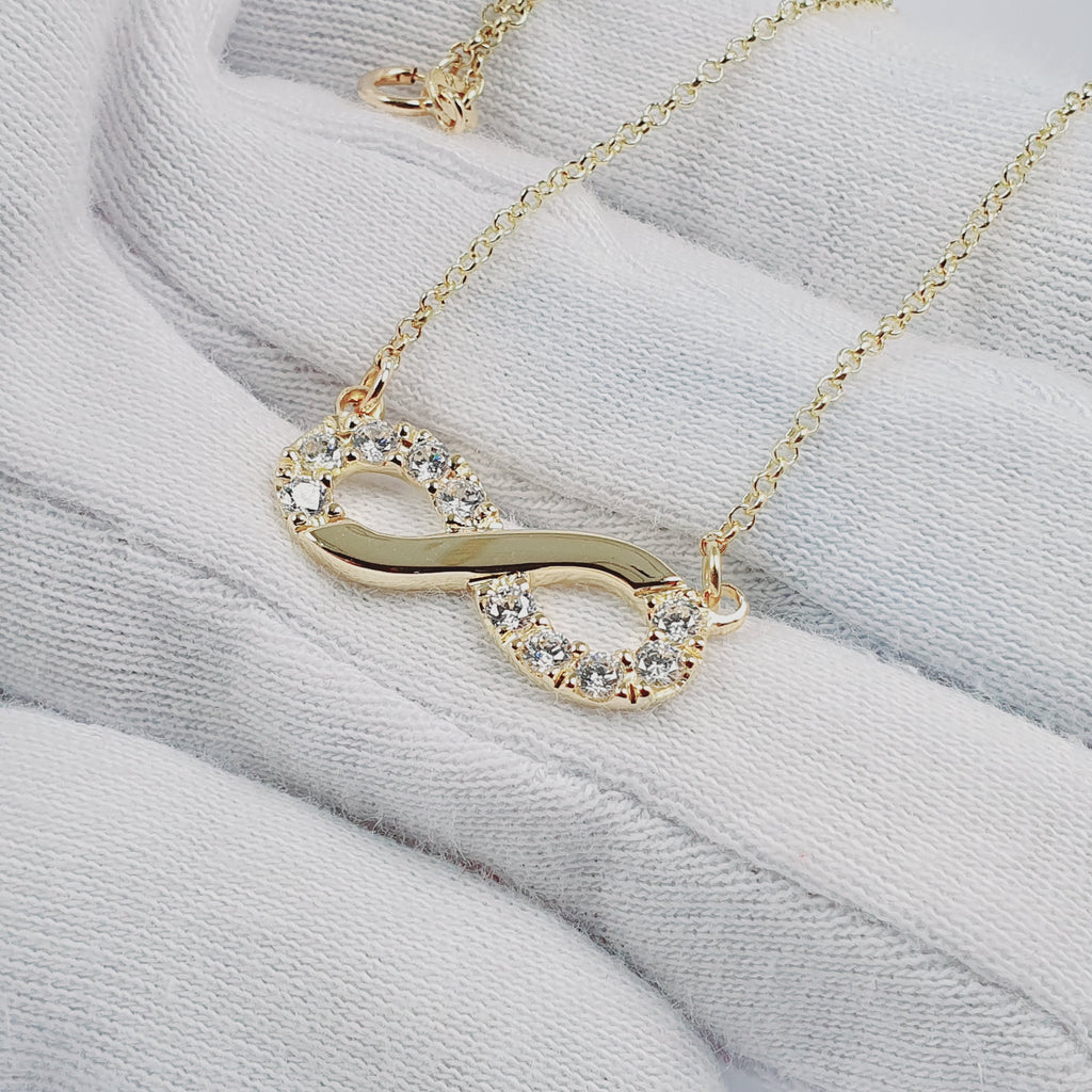 Collar infinito con piedras oro 18k