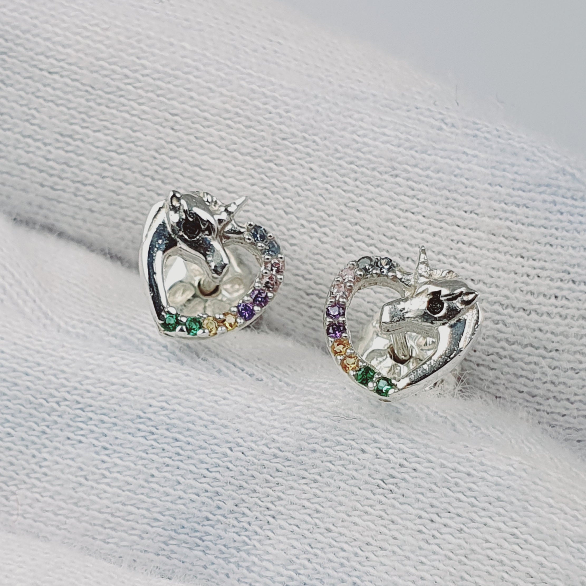 Aretes de unicornio en plata con piedras