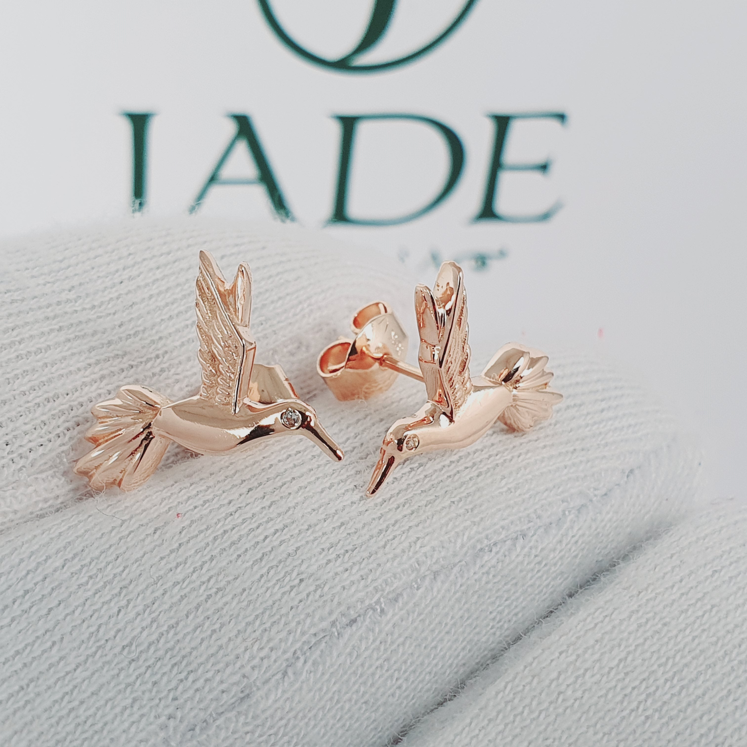 Aretes de ave colibri oro 18k