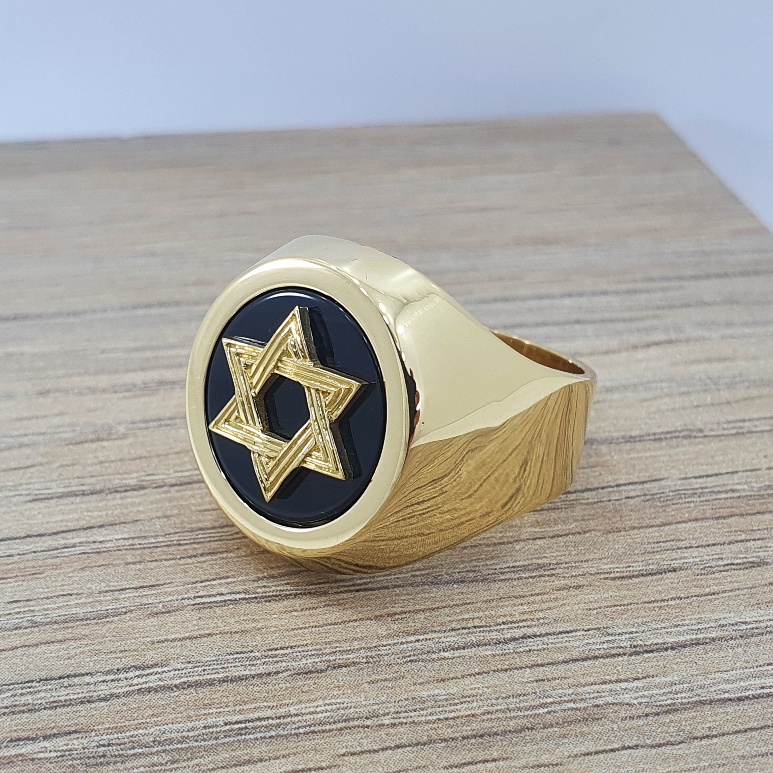 Anillo Bolichera estrella de david para varón con onix tapado