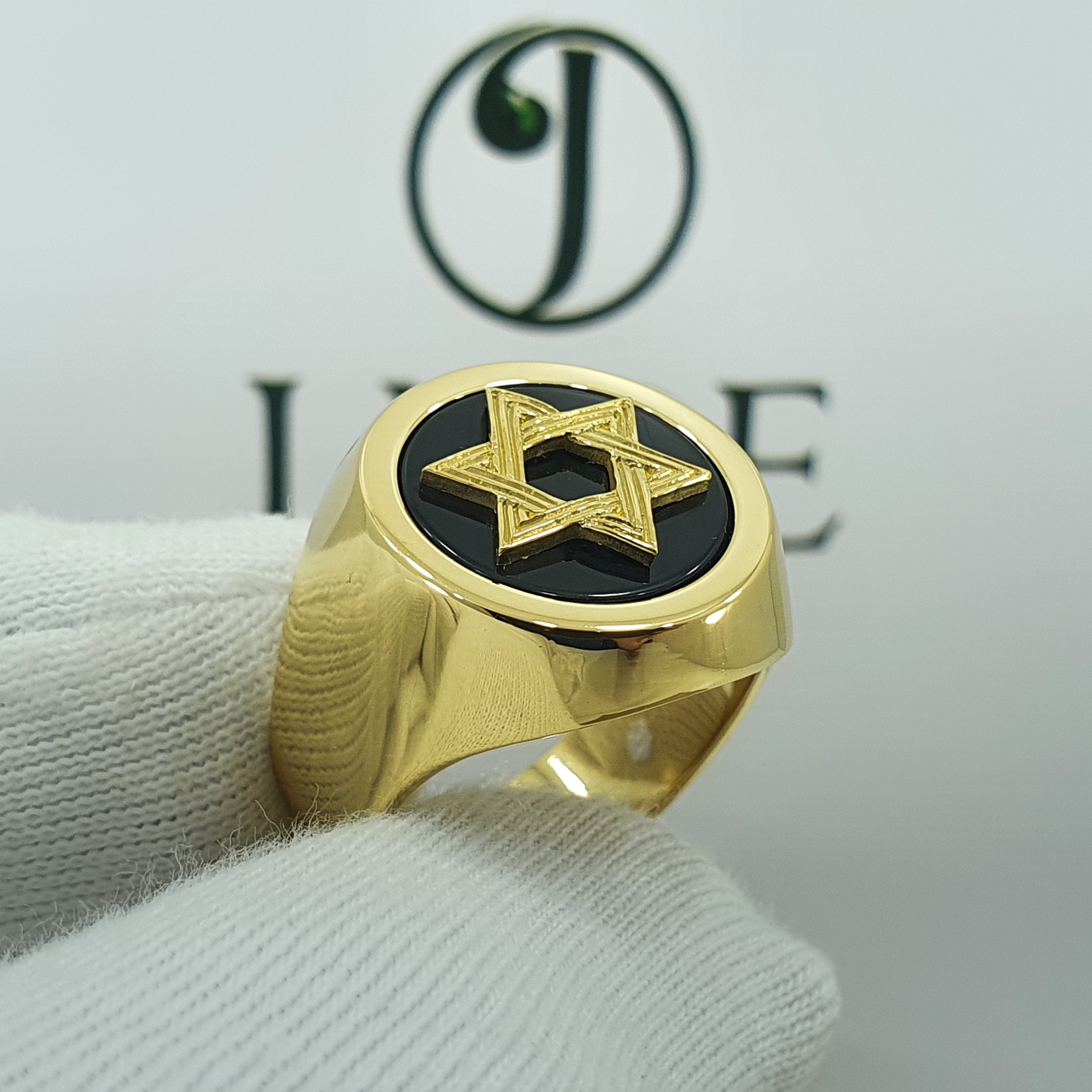 Anillo Bolichera estrella de david para varón con onix tapado