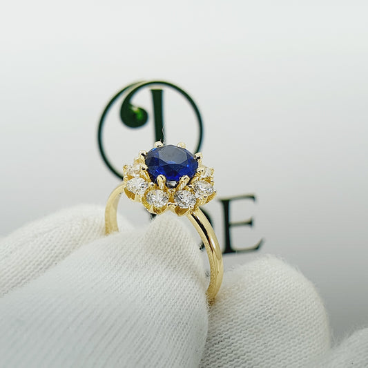 Anillo en oro piedra azul