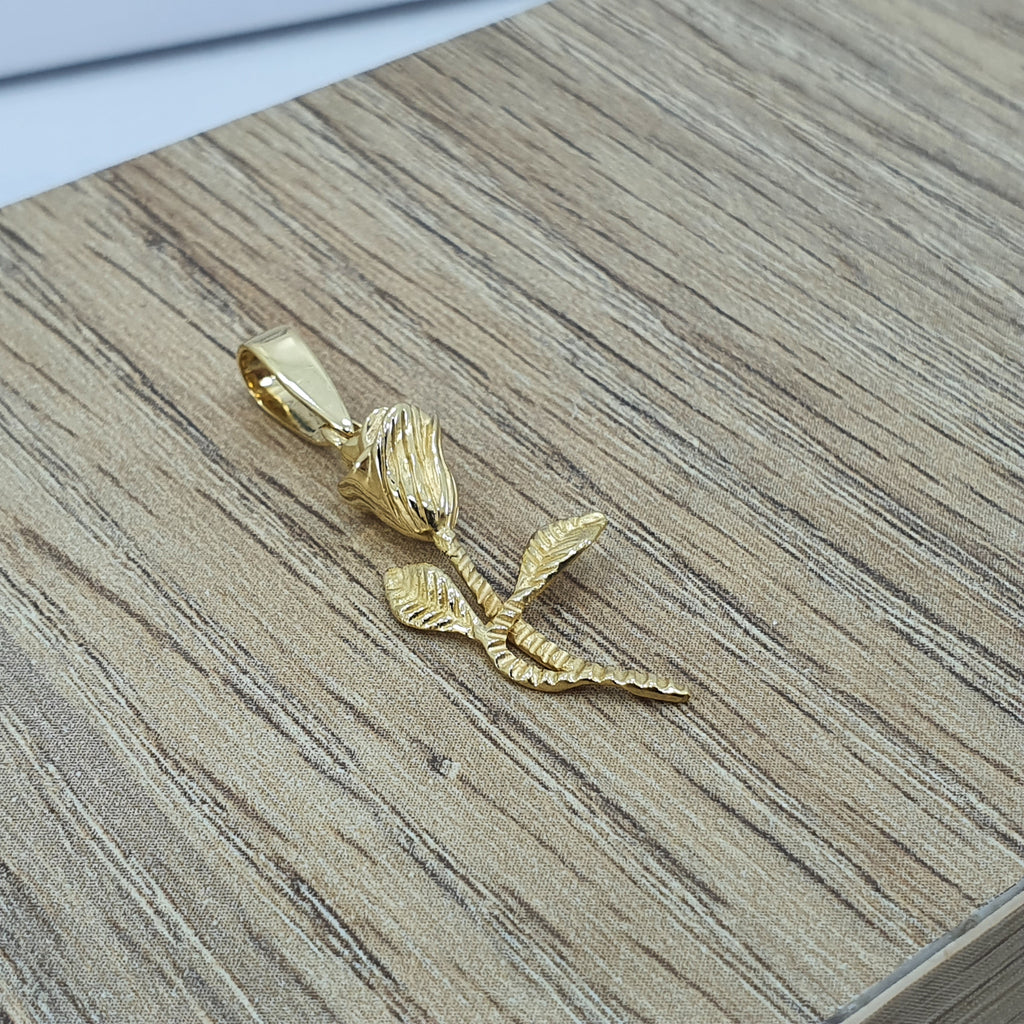 Dije de Flor labrado oro 18k