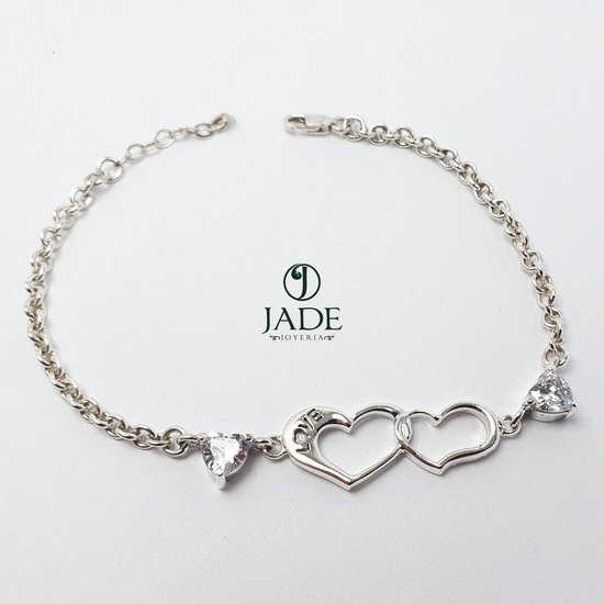 Pulsera con dos corazones entrelazados en plata fina – Jade18k