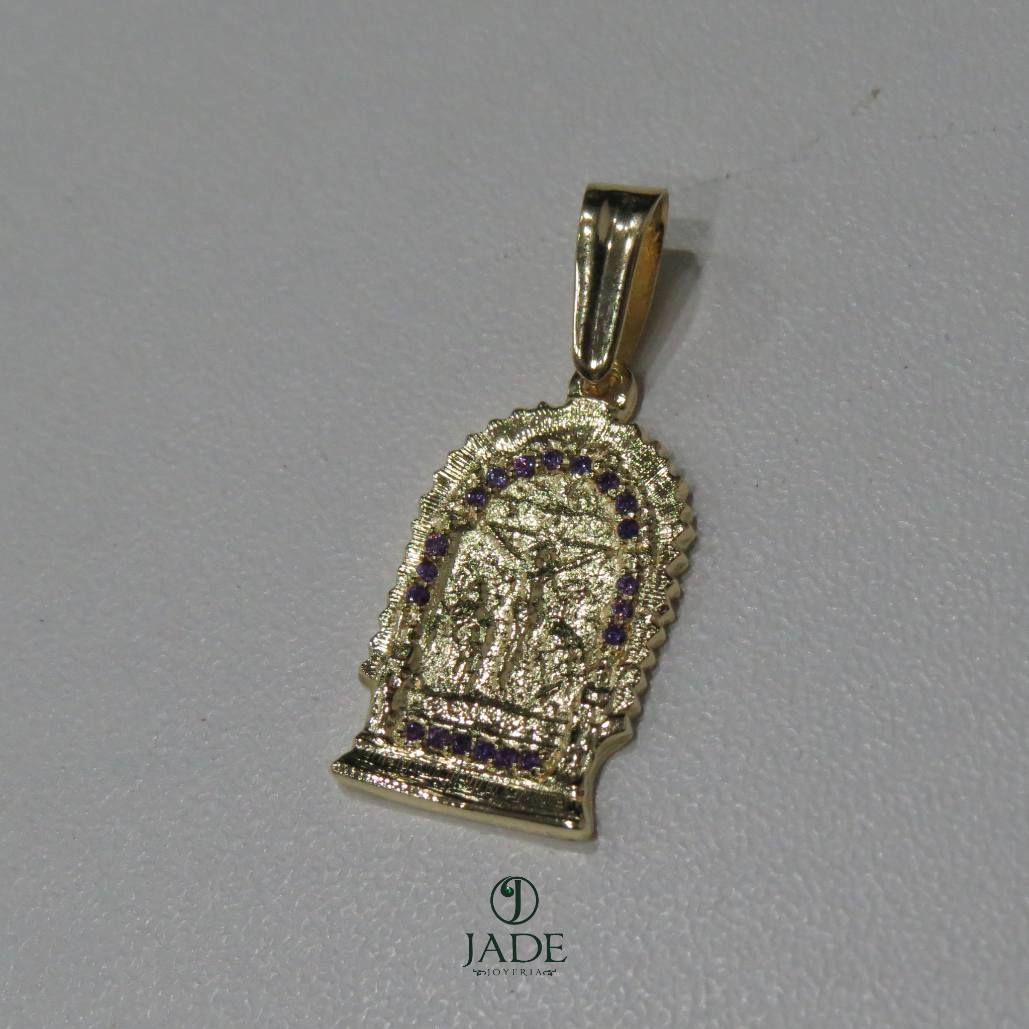 Dije del Señor de los milagros