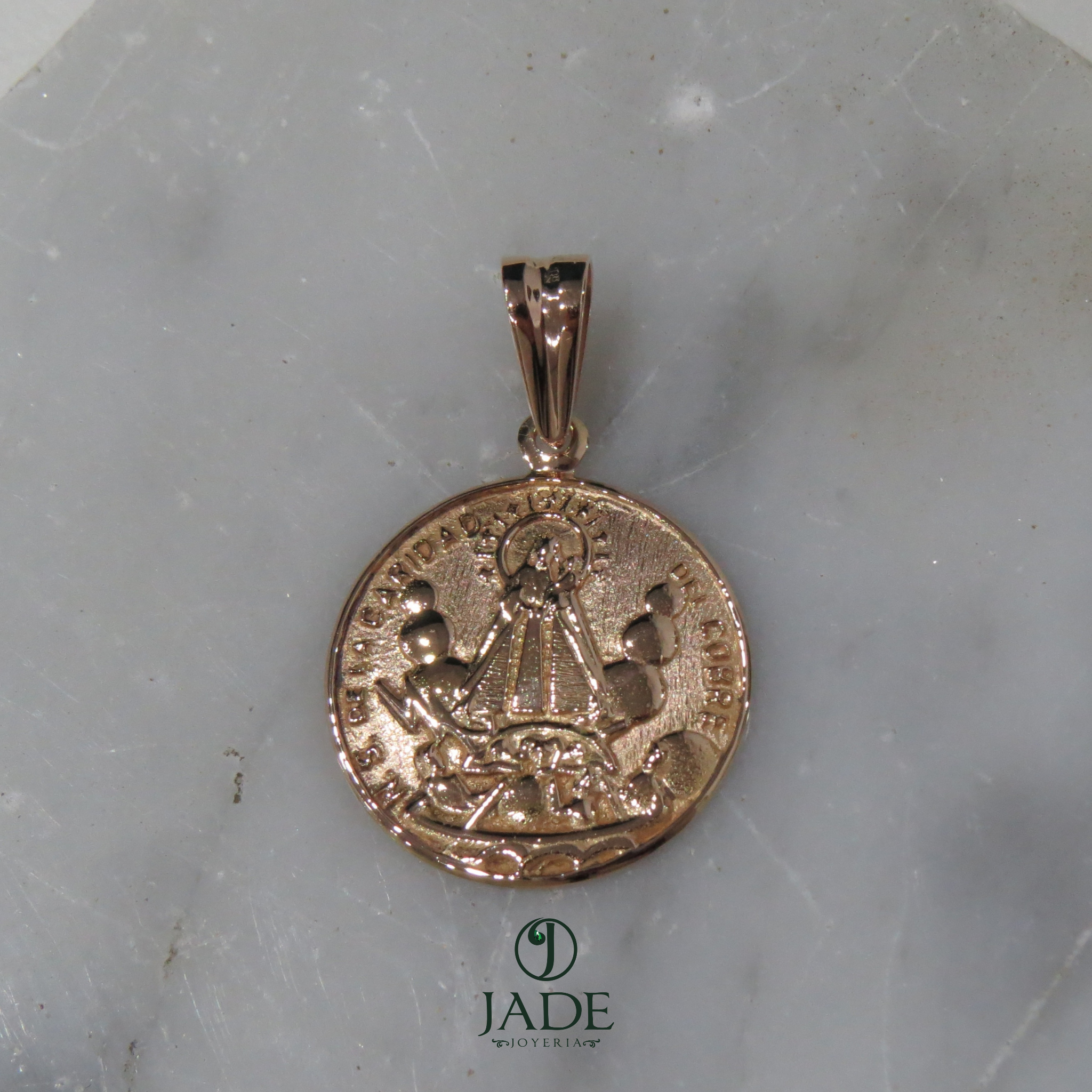 Dije de NS de la caridad del cobre