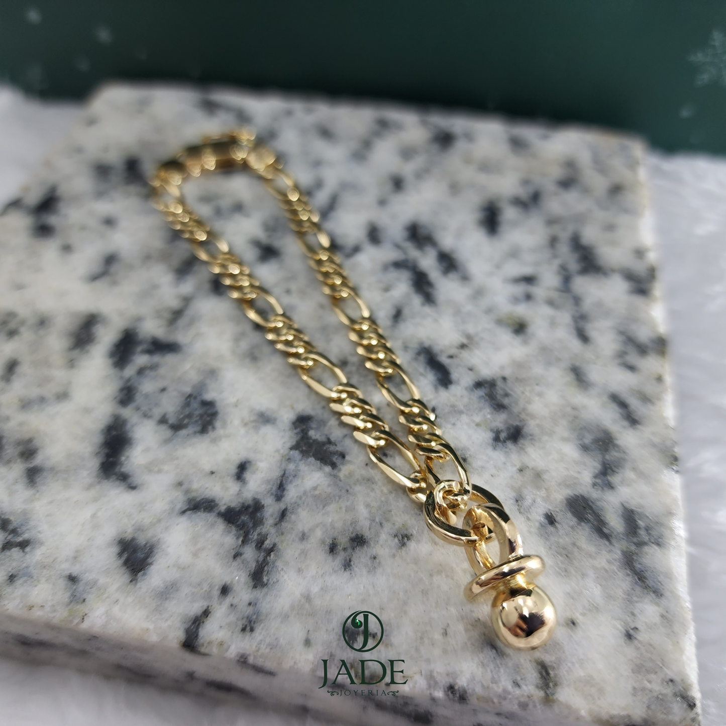 Pulsera Chupón en oro de 18k