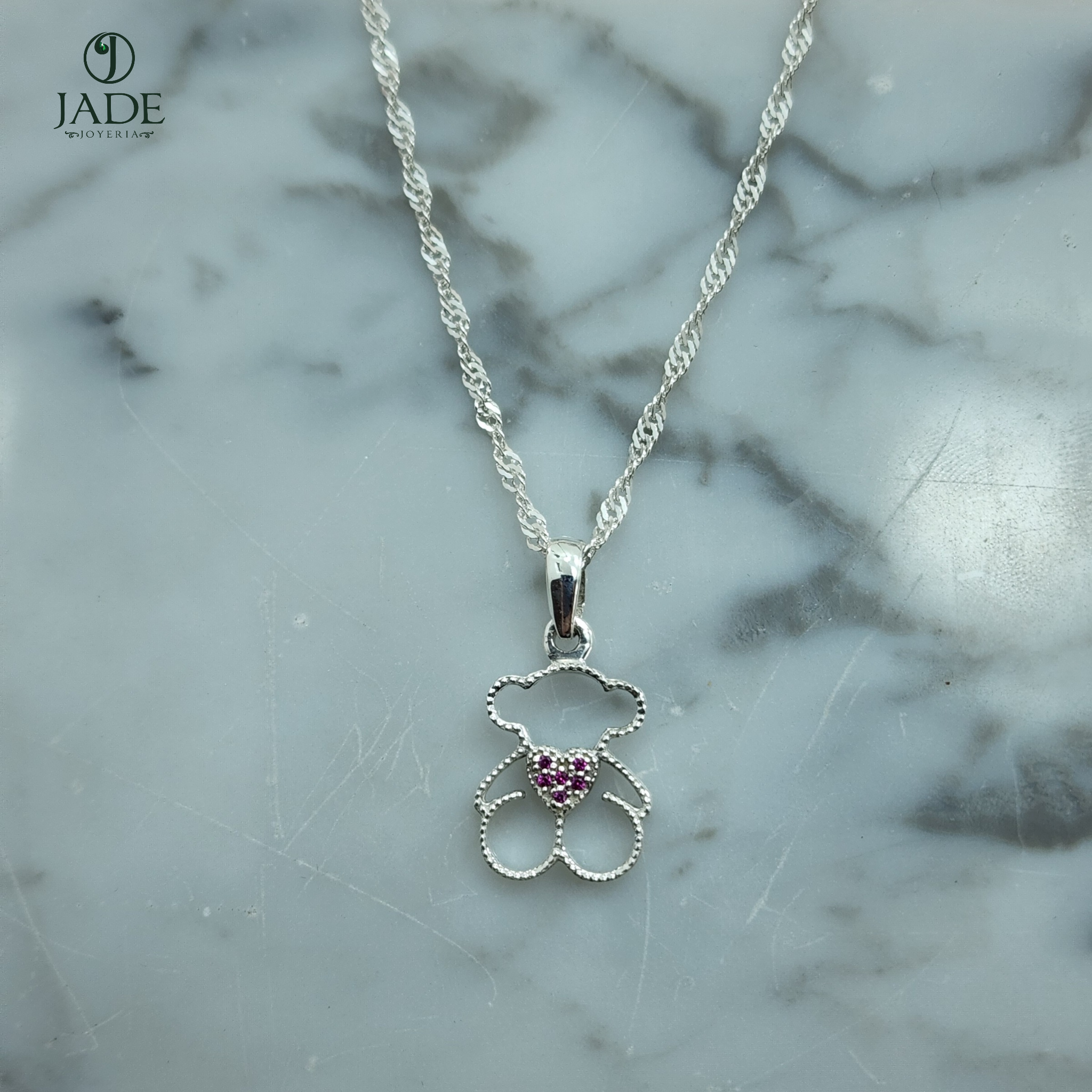 Dije de Tous en plata fina