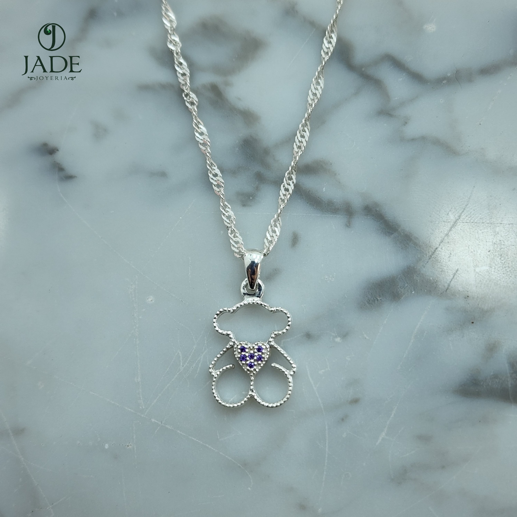 Dije de Tous en plata fina