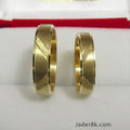 Aros de matrimonio Unión en oro de 18k