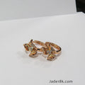 Aretes argolla flor trimera en oro18k