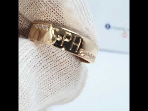 Aros de boda personalizado con iniciales corazón y piedra