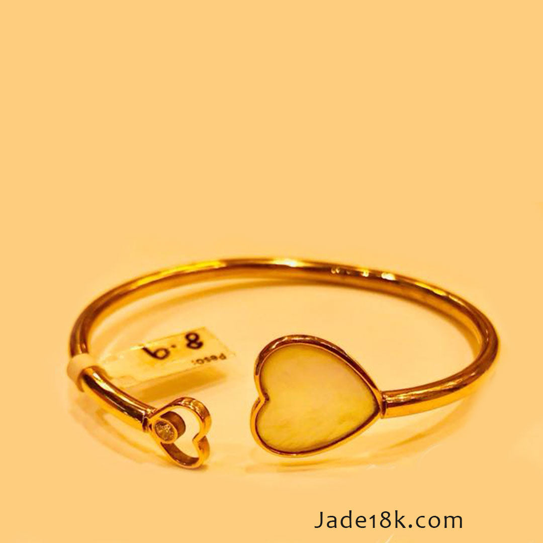 Puñera Amor en oro 18k