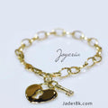 Pulsera con dije candado corazón