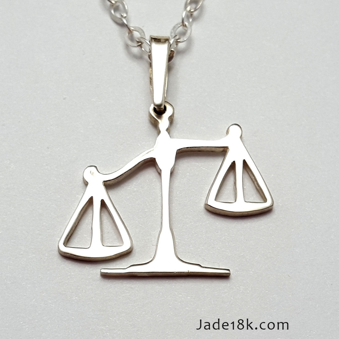 Dije de Derecho en Plata Ley
