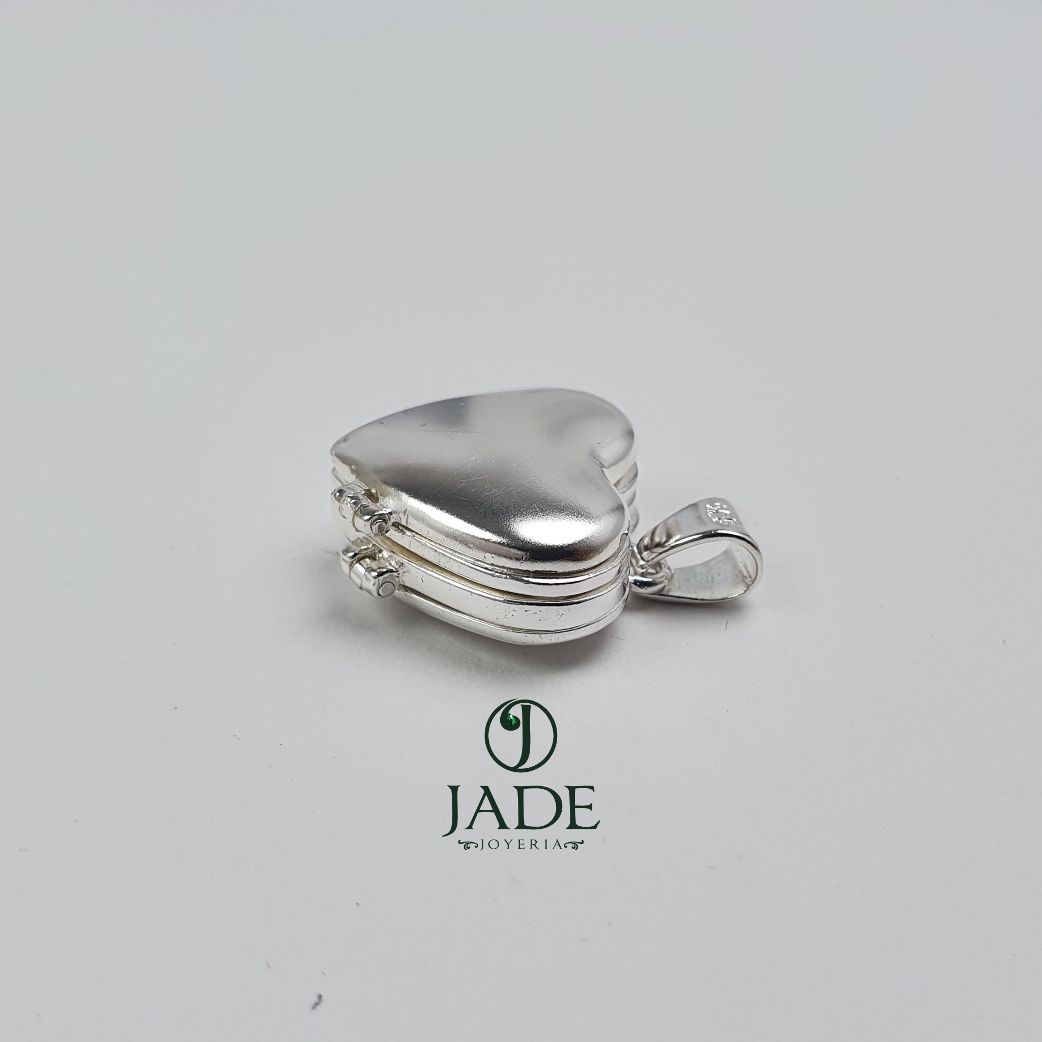 Relicario de corazón para 4 fotos en plata fina