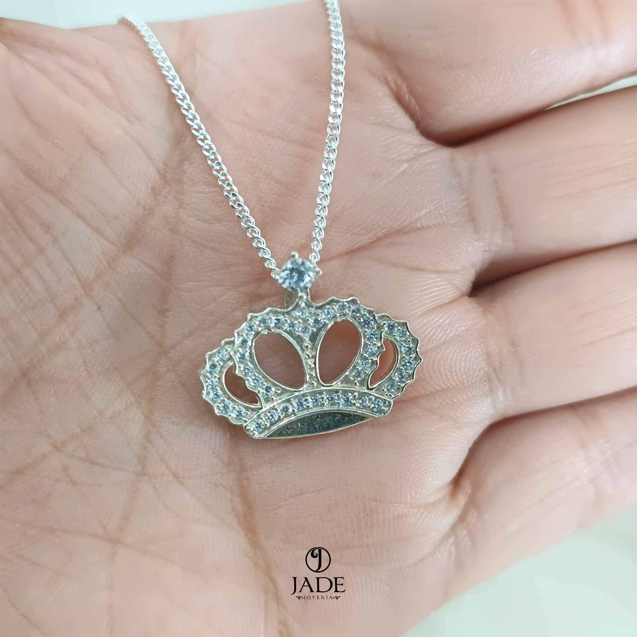 Dije Corona en plata