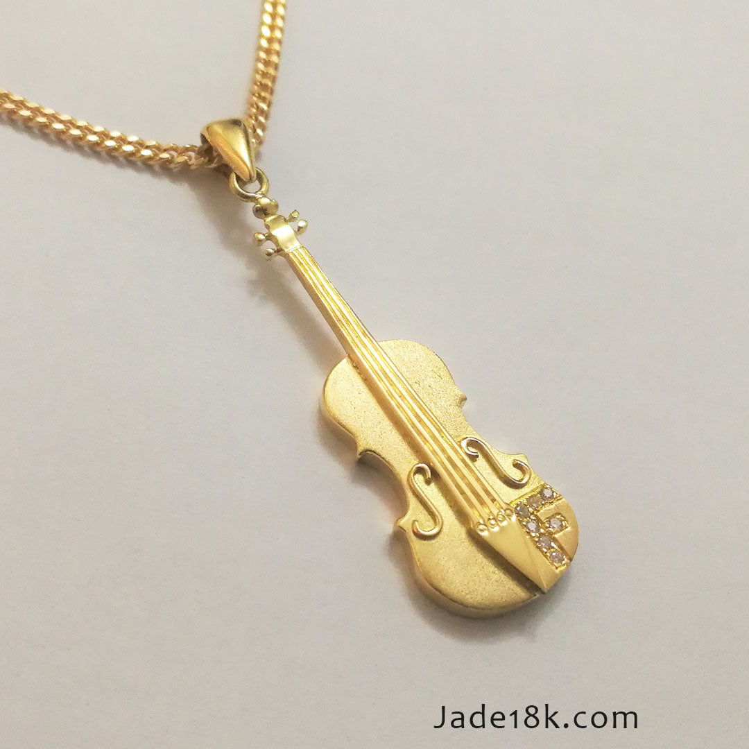 Dije de Violin Oro 18k
