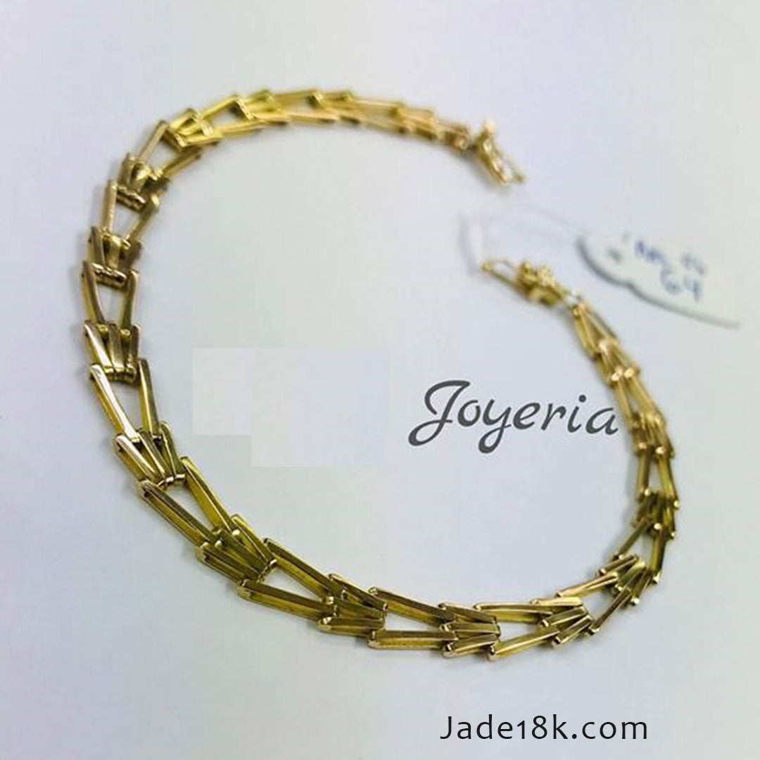 Pulsera tipo espiga en oro 18k